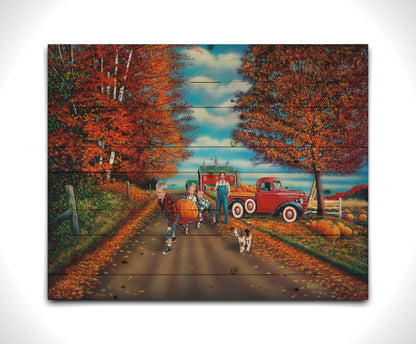 A painting of a fall scene, with a group of children moving a large pumpkin with a wagon alongside their dog, leaving a farmer's pumpkin patch. Printed on a wood pallet.