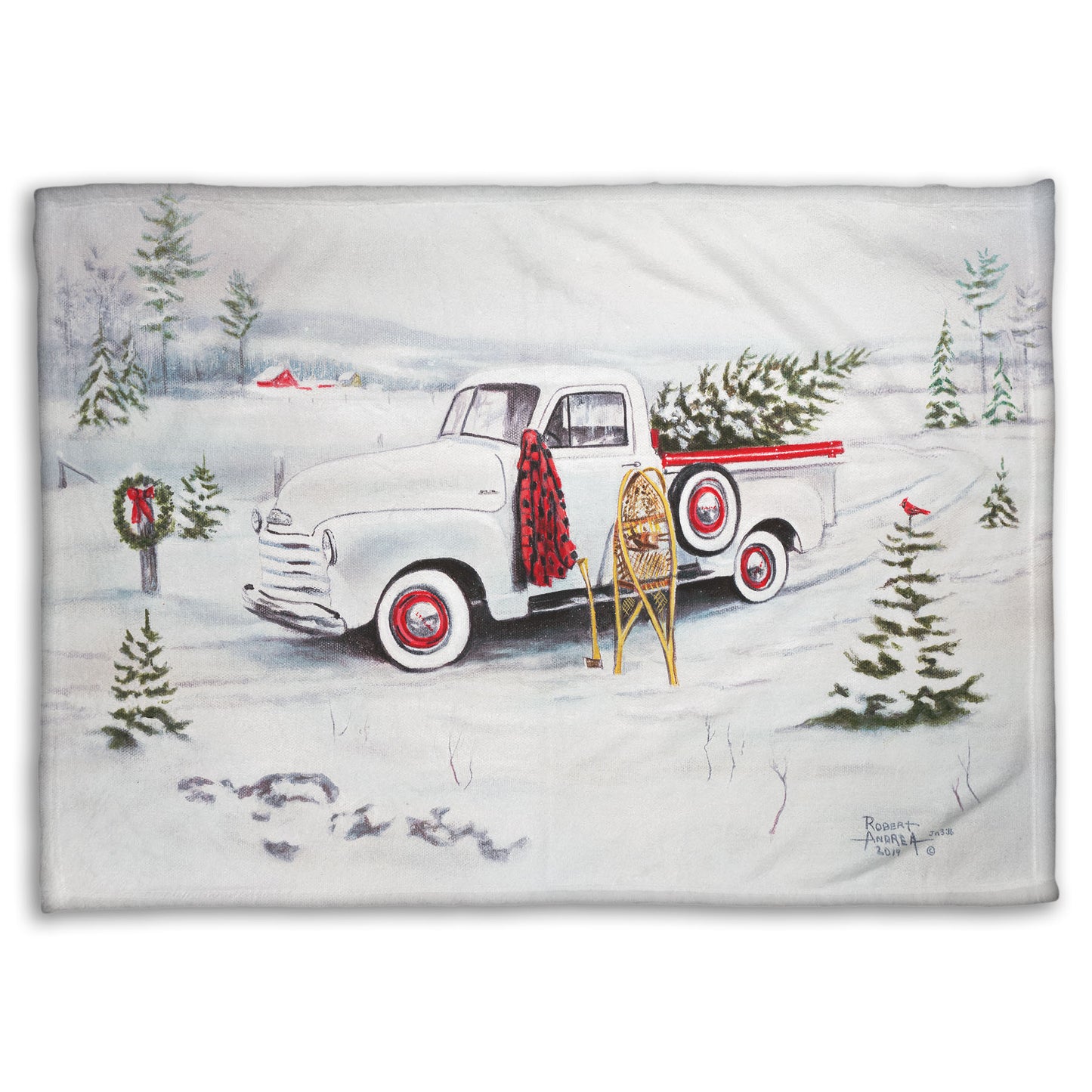 Festive blanket with a vintage truck and Christmas trees design.