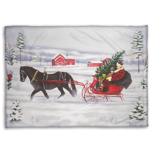 Festive blanket with a horse pulling a family in a sleigh through the snow with a christmas tree.
