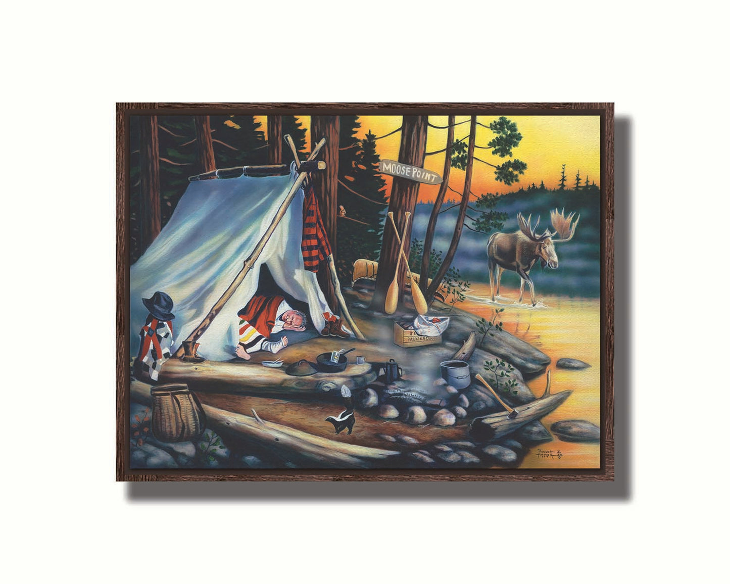 A painting of a campsite at sunset. A moose walks by in the water, as two hunters sleep peacefully, missing out on their prey. Printed on canvas in a float frame.