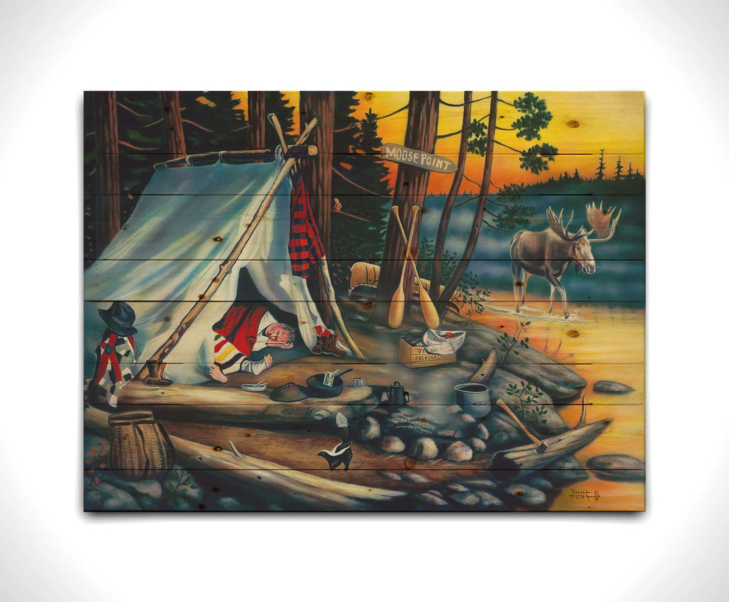 A painting of a campsite at sunset. A moose walks by in the water, as two hunters sleep peacefully, missing out on their prey. Printed on a wood pallet.