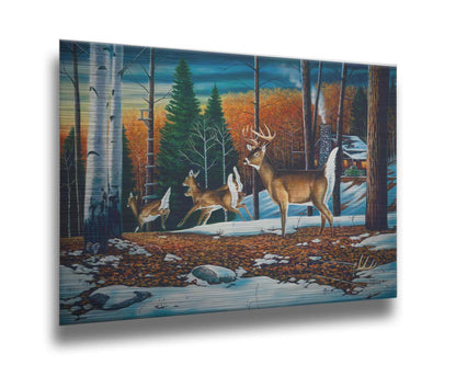 A painting of a group of deer running through the forest. There are snow and leaves on the ground, and a cabin in the distance. Printed on metal.