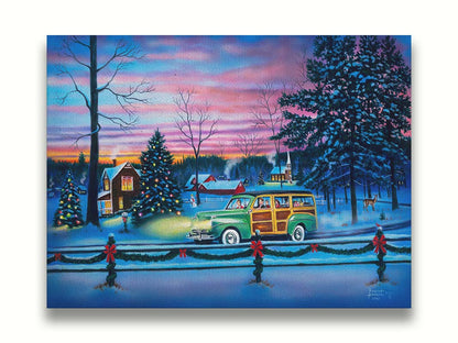 A painting of a snowy town, decorated with Christmas lights. A 1950s family drive past in a car full of presents at sunset. Printed on canvas.