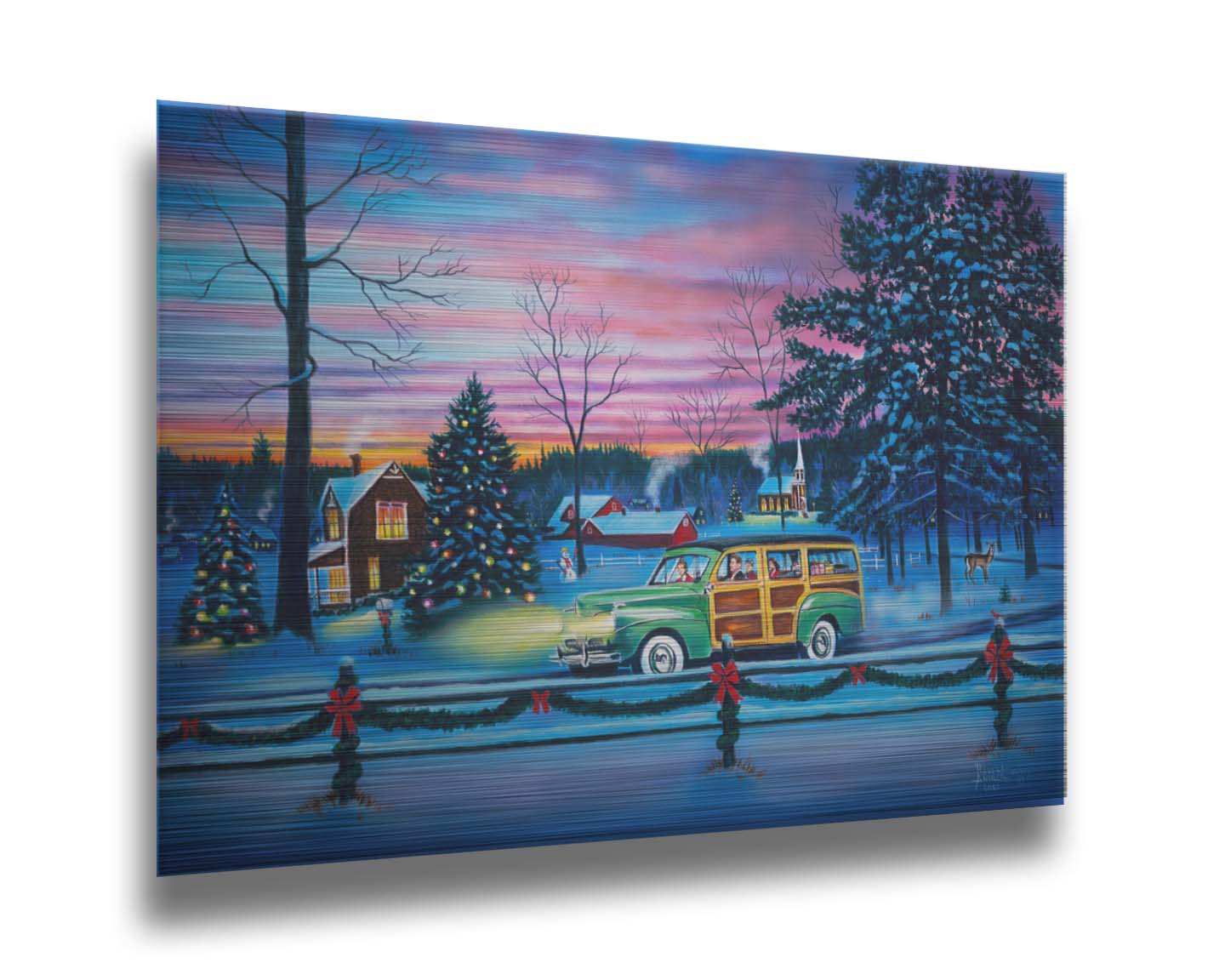 A painting of a snowy town, decorated with Christmas lights. A 1950s family drive past in a car full of presents at sunset. Printed on metal.