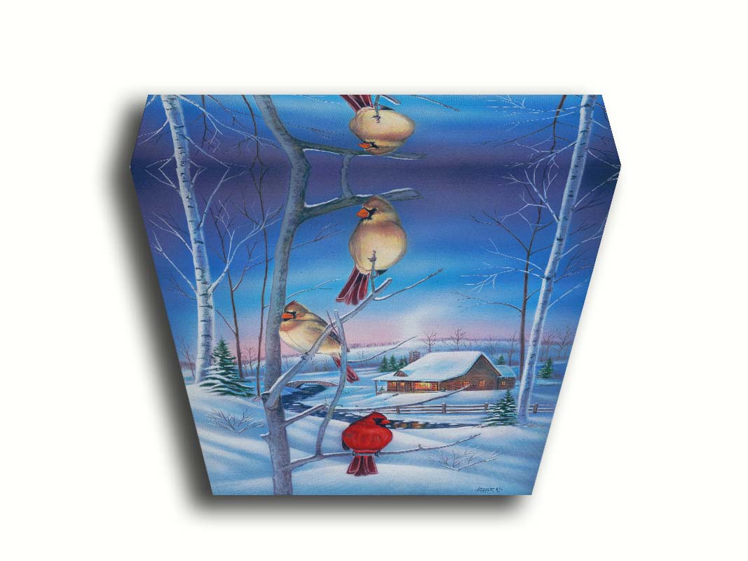 A painting of three cardinals, perched on branches above the snow. A cabin can be seen in the background, warm and inviting. Printed on canvas.