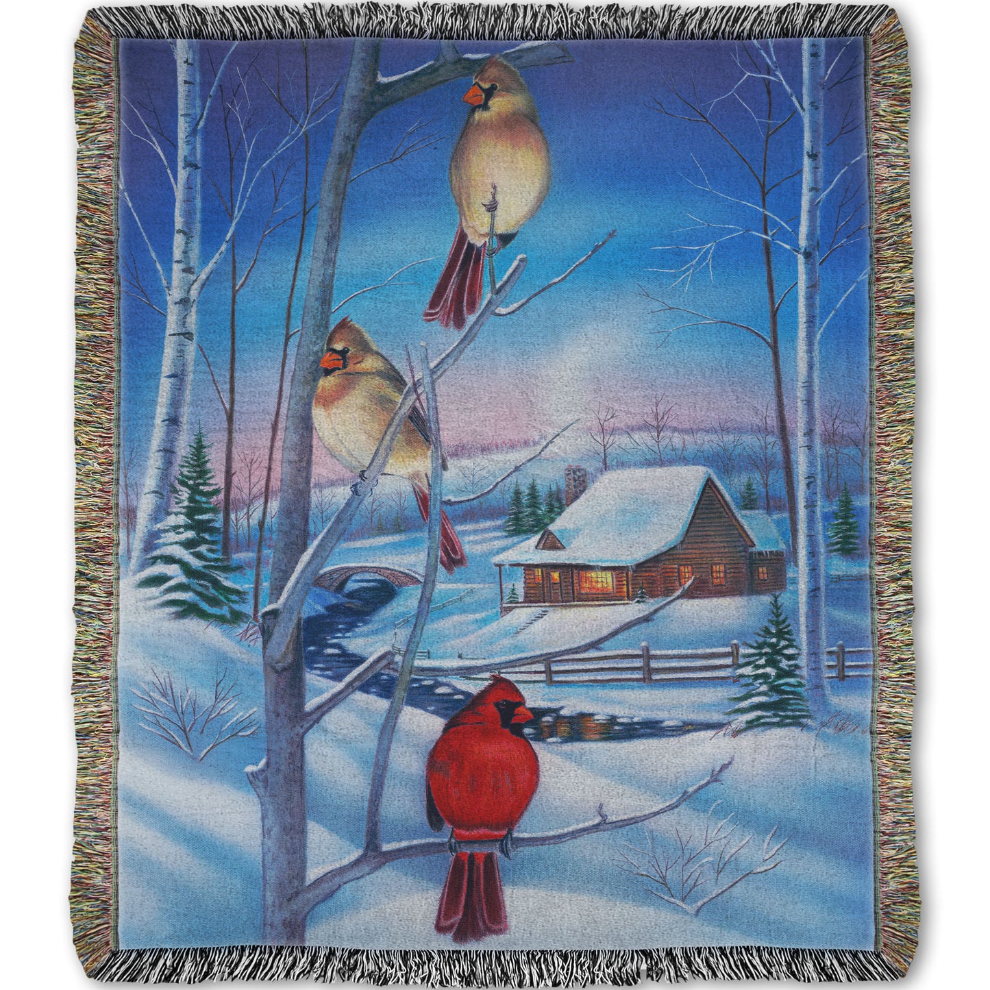 Woven throw blanket designed with a snowy winter scene, focused on cardinals near a cabin.