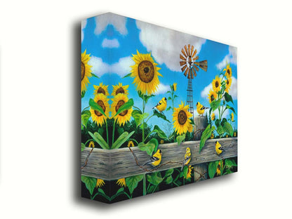 A painting of a field of sunflowers and yellow American Goldfinches, also known as chickadees. The sky is a vibrant blue, and a windmill sits in the background. Printed on canvas.