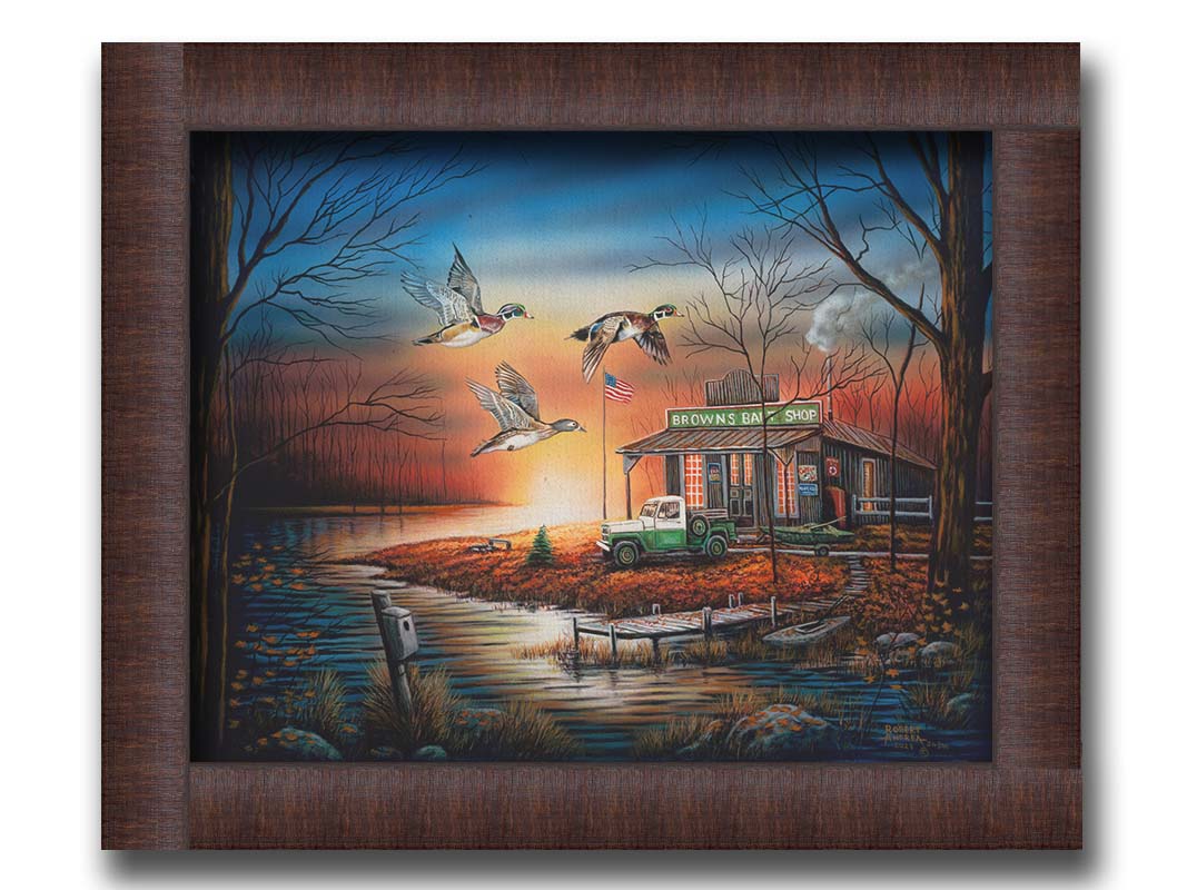 A painting of three ducks flying over the water, in front of a bait shop at sunset. Printed on canvas and framed.