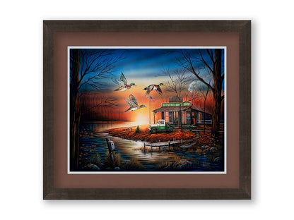 A painting of three ducks flying over the water, in front of a bait shop at sunset. Printed on paper, matted, and framed.