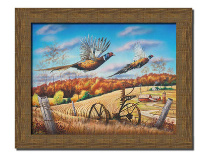 A painting of two pheasants taking flight over a fall wheat field. Printed on canvas and framed.