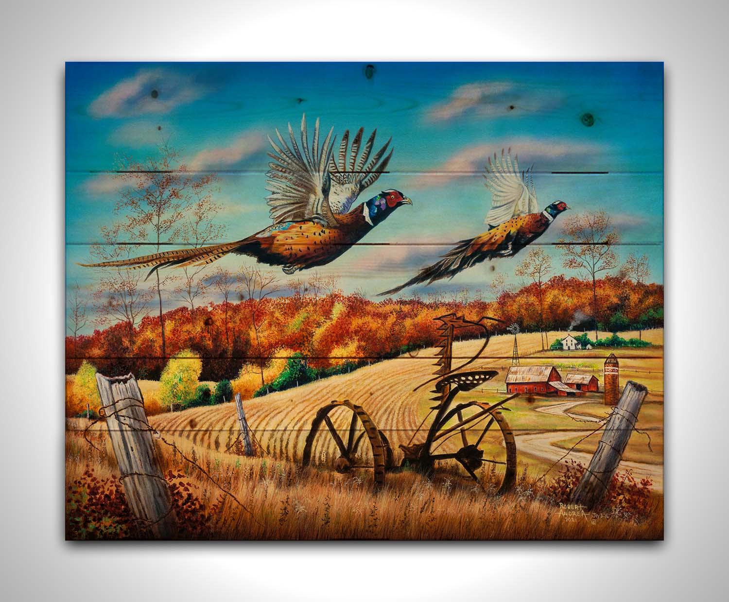 A painting of two pheasants taking flight over a fall wheat field. Printed on a wood pallet.