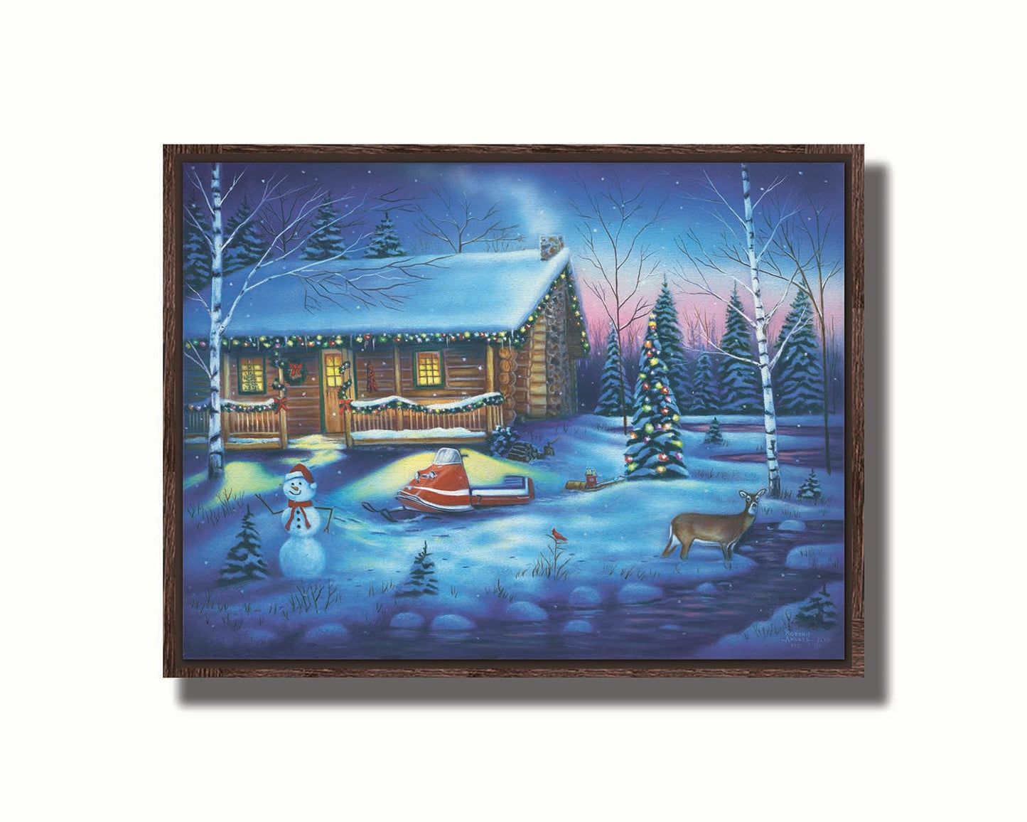 A painting of a snowy cabin decorated with Christmas lights. A deer treks through the snow in the yard, past a snowman to a stream. Printed on canvas in a float frame.