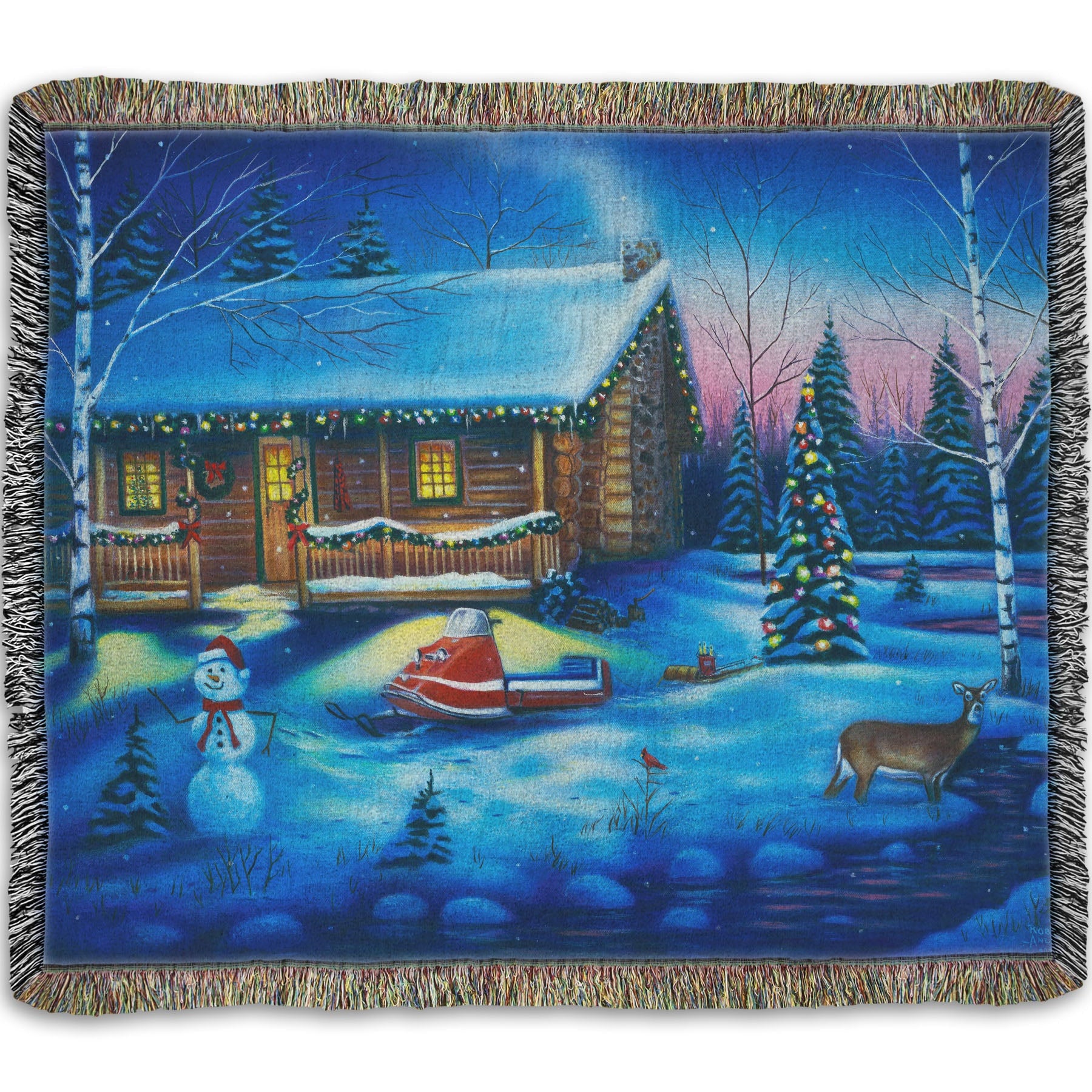A festive woven throw blanket decorated with the painting of a snowy cabin decorated with Christmas lights.