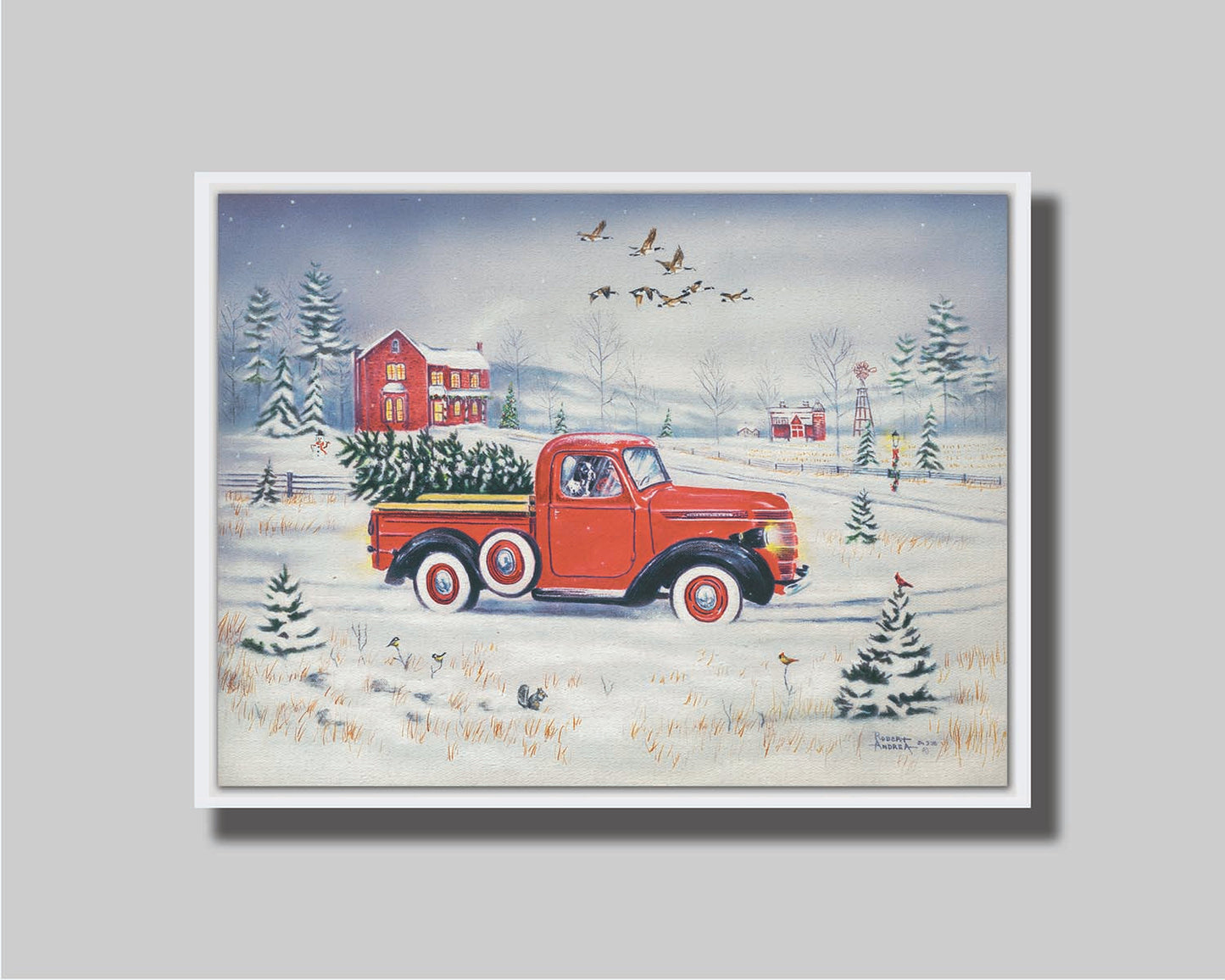 A painting of a vintage red truck, carrying a freshly cut evergreen tree. It is driving toward some red homes in the distance. Geese fly overhead, and birds and squirrels est on the ground near the road. Printed on canvas in a float frame.