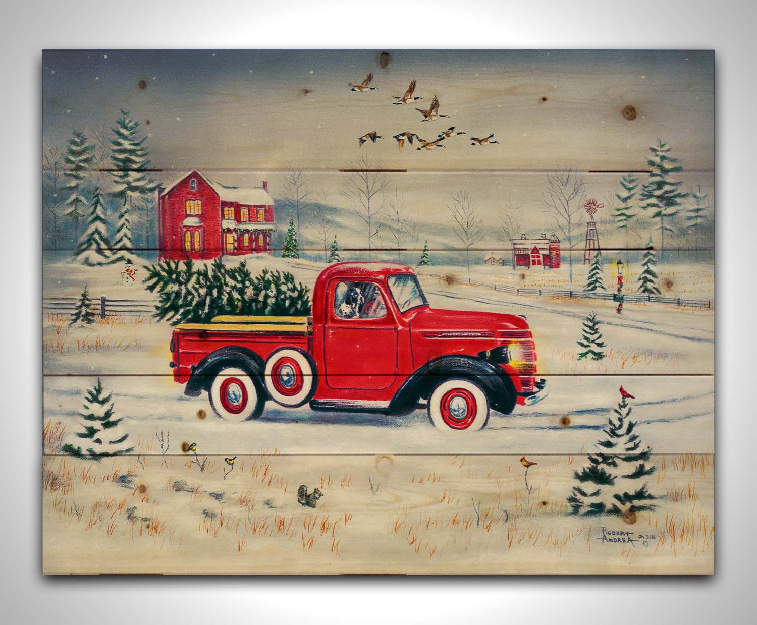 A painting of a vintage red truck, carrying a freshly cut evergreen tree. It is driving toward some red homes in the distance. Geese fly overhead, and birds and squirrels est on the ground near the road. Printed on a wood pallet.