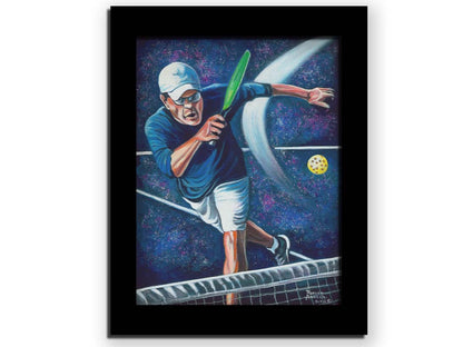 A painting of a man swinging a pickleball paddle, hitting the ball over the net. Printed on canvas and framed.