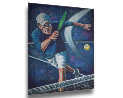 A painting of a man swinging a pickleball paddle, hitting the ball over the net. Printed on metal.