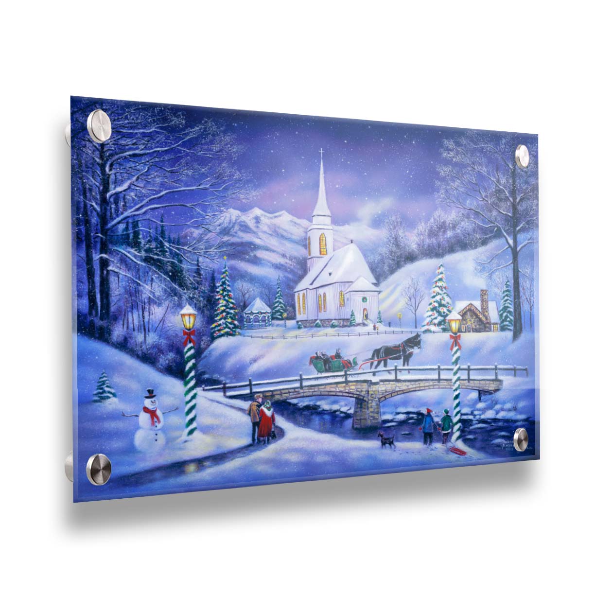 A painting of a snowy mountain town, decorated for Christmas. A tall church sits in the middle of town. A horse-drawn sleigh crosses a bridge over a freezing river. Printed on acrylic.