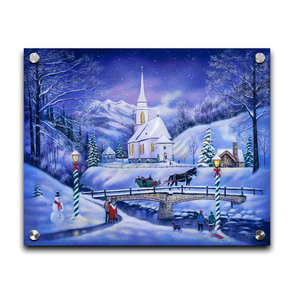 A painting of a snowy mountain town, decorated for Christmas. A tall church sits in the middle of town. A horse-drawn sleigh crosses a bridge over a freezing river. Printed on acrylic.