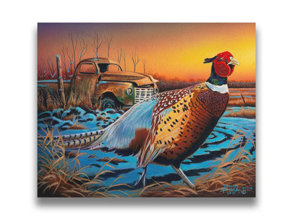 A painting of a pheasant trotting through a snowy field. In the background, an old green truck sits rusted. The sun is low in the sky, creating a soft orange atmosphere. Printed on canvas.