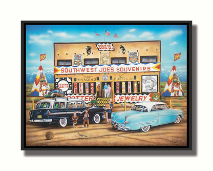 A painting of an American southwestern storefront. Several vintage cars packed for road trips are parked at the front of the souvenir shop. Printed on canvas in a float frame.