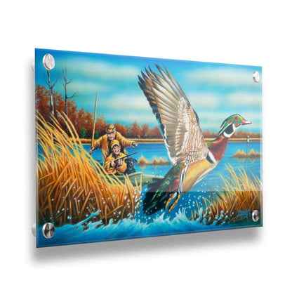 A painting of a wood duck taking flight off the water, after being startled by two approaching hunters in a kayak. Printed on acrylic.