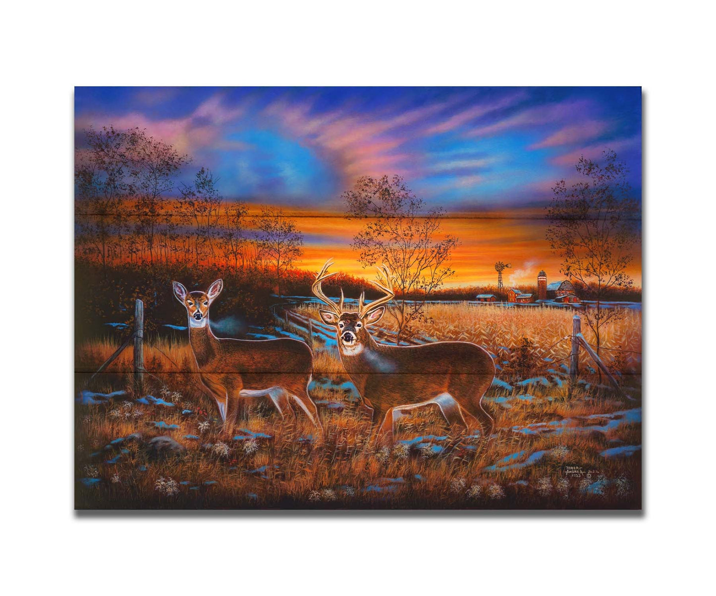 A painting of two whitetail deer in a field during a vivid sunset, with a large barn in the background. Printed on a box board.