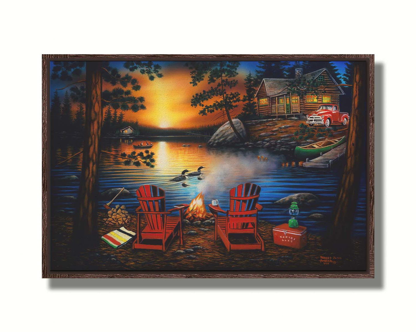 A painting of Kakagi Lake in Ontario, Canada. Cabins sit on the shore by docks of canoes used by fishermen. In the foreground, lawn chairs sit by a campfire. Printed on canvas in a float frame.