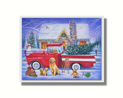 A painting of a red truck, parked in the snow outside a stone house decorated with Christmas lights. An evergreen is in the bed of the truck, and a family of golden retrievers sit in and around the vehicle. Printed on canvas in a float frame.