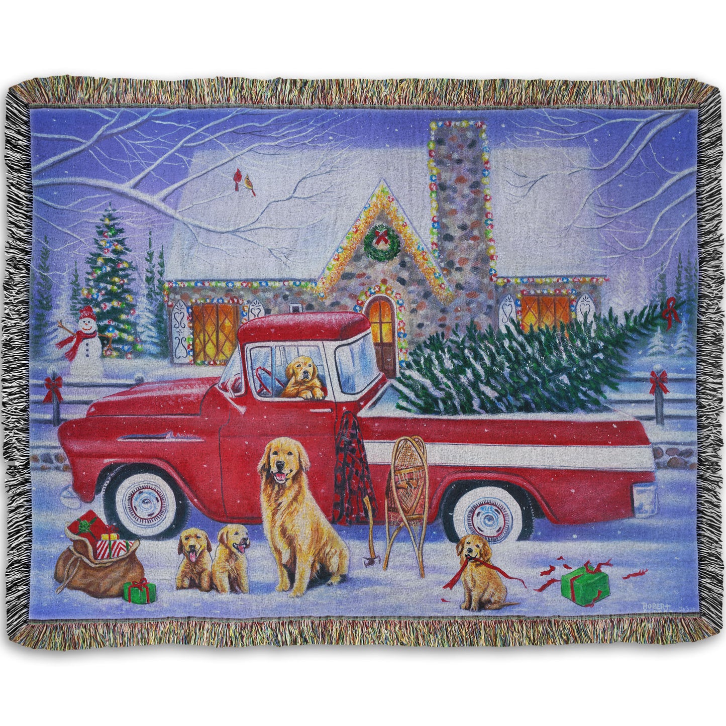 A throw blanket woven to design a painting of a vintage red truck carrying a Christmas tree to a decorated house, surrounded by a family of golden retriever dogs.