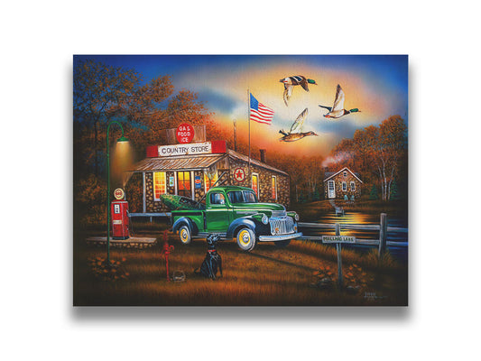 A painting of a "Country Store" and gas station, with a small house in the background. A small pond, with a sign reading "Mallard Lake," is beside it. A little green truck is parked in the front, carrying a green kayak. A black dog sits nearby, watching three mallard ducks fly overhead. Printed on canvas.