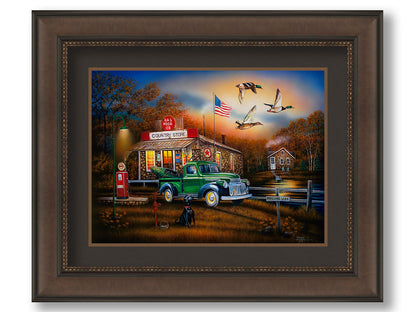 A painting of a "Country Store" and gas station, with a small house in the background. A small pond, with a sign reading "Mallard Lake," is beside it. A little green truck is parked in the front, carrying a green kayak. A black dog sits nearby, watching three mallard ducks fly overhead. Printed on paper, matted, and framed.