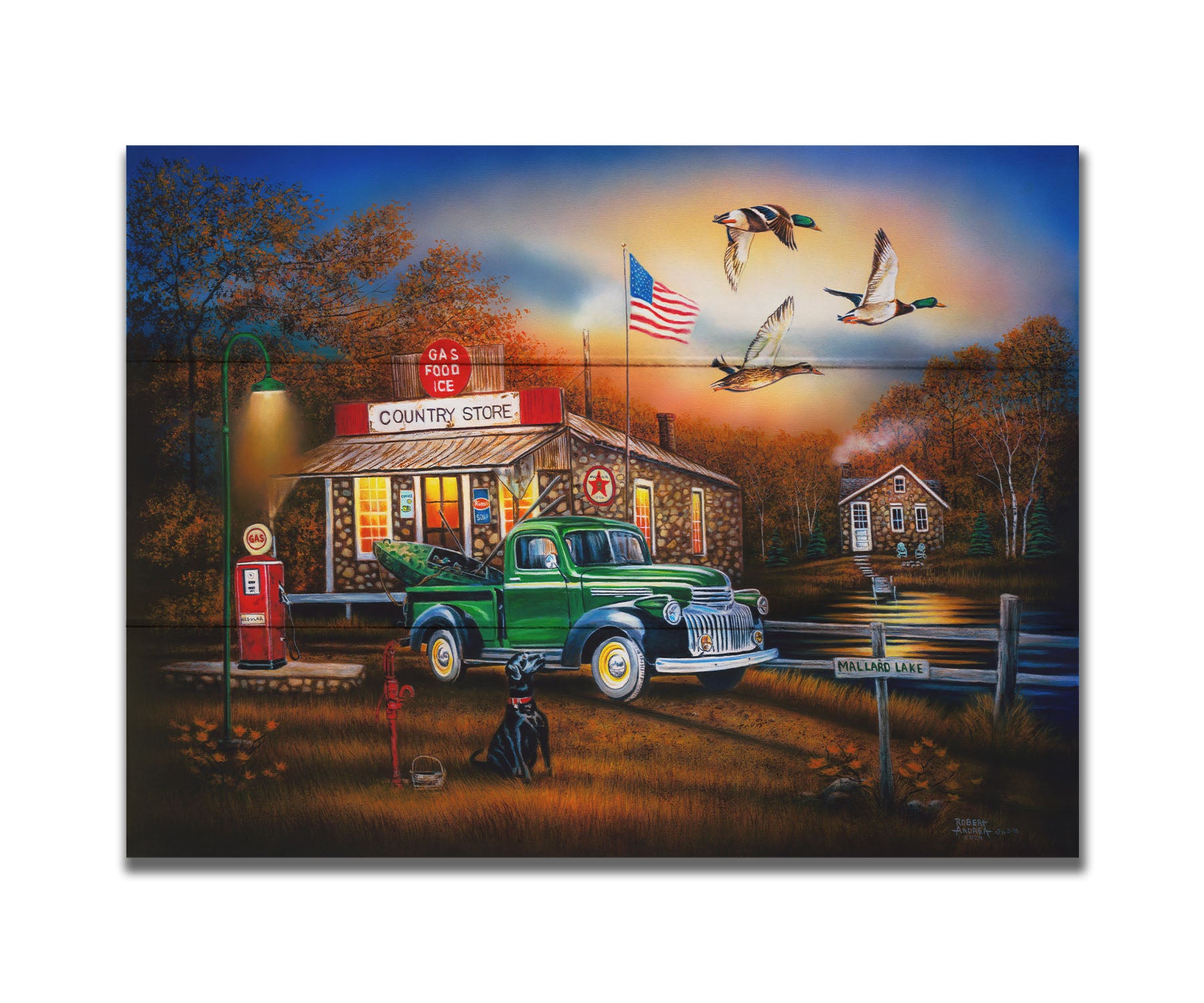 A painting of a "Country Store" and gas station, with a small house in the background. A small pond, with a sign reading "Mallard Lake," is beside it. A little green truck is parked in the front, carrying a green kayak. A black dog sits nearby, watching three mallard ducks fly overhead. Printed on a box board.