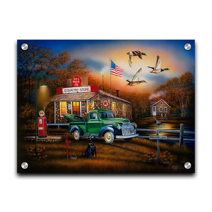 A painting of a "Country Store" and gas station, with a small house in the background. A small pond, with a sign reading "Mallard Lake," is beside it. A little green truck is parked in the front, carrying a green kayak. A black dog sits nearby, watching three mallard ducks fly overhead. Printed on acrylic.