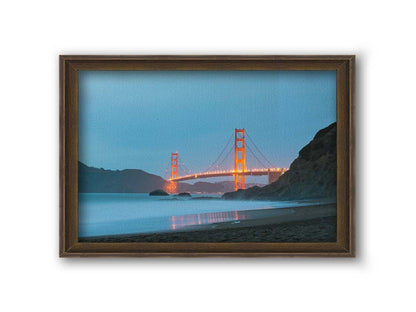 Photo at Baker Beach, San Francisco, looking out over the water at the Golden Gate Bridge. Printed on canvas and framed.