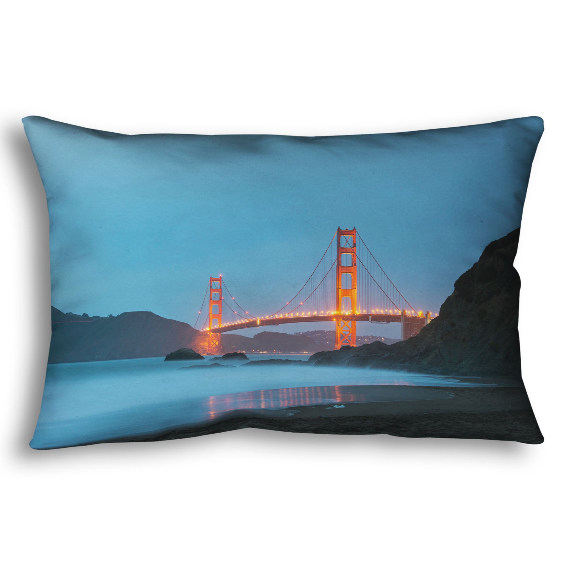 A throw pillow designed with a photo from Baker Beach, San Francisco, looking out over the water at the Golden Gate Bridge.