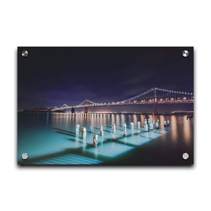 Photo of the Oakland Bay Bridge in San Francisco at night, taken from the Embarcadaro. Printed on acrylic.