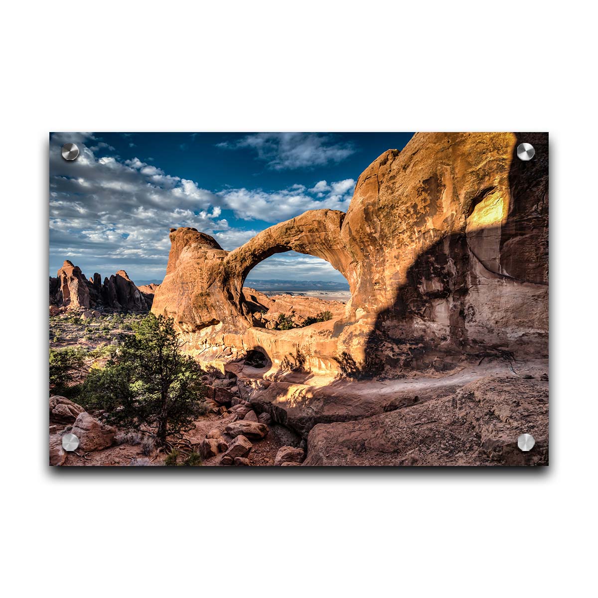 Photo of the Double O arch in the Devil's Garden at Arches National Park, Utah. The rocky arch is set against a bright blue sky. Printed on acrylic.