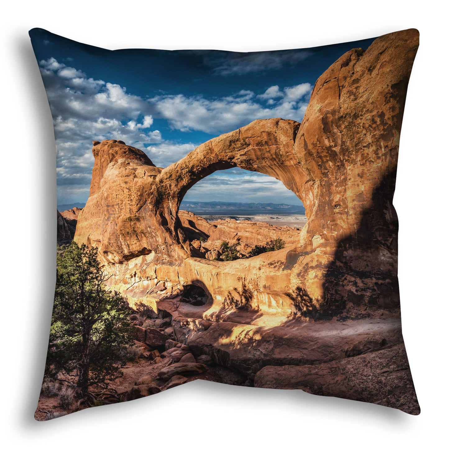 Square throw pillow designed with a photo of the Double O arch in the Devil's Garden at Arches National Park, Utah. The rocky arch is set against a bright blue sky.