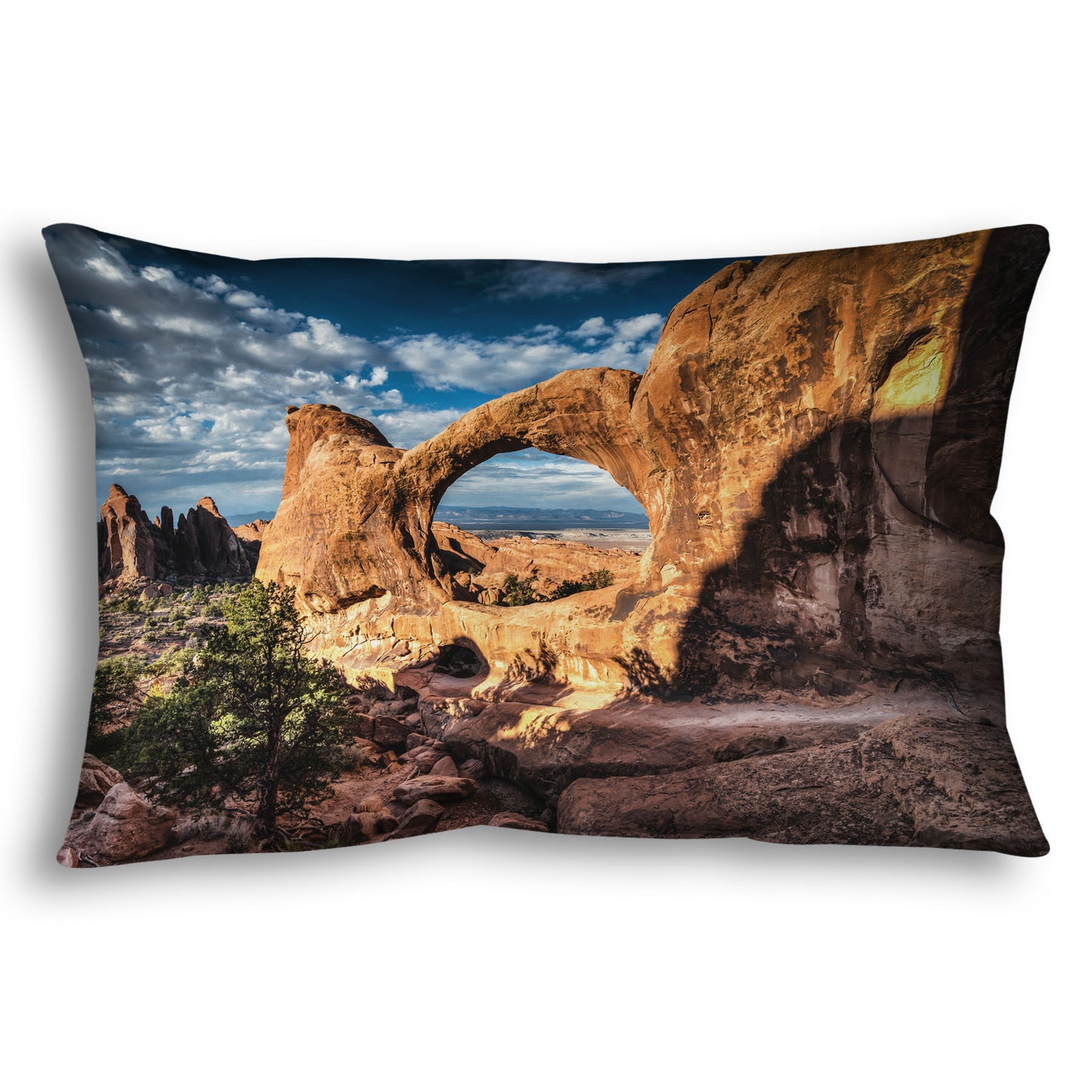 Rectangular throw pillow designed with a photo of the Double O arch in the Devil's Garden at Arches National Park, Utah. The rocky arch is set against a bright blue sky.