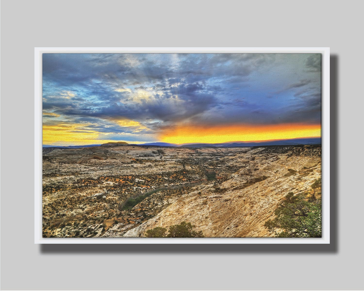 Photo of a vibrant sunset at Escalante National Monument in Utah. Printed on canvas in a float frame.