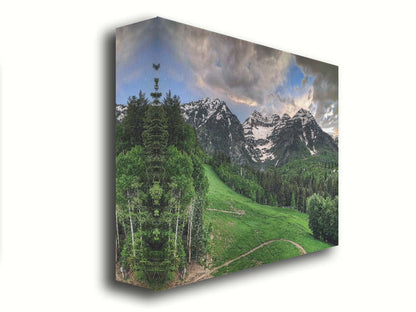 Photo of snowcapped mountains and rolling green hills and forestry, at the Sundance Ski Resort in Utah. Printed on canvas.