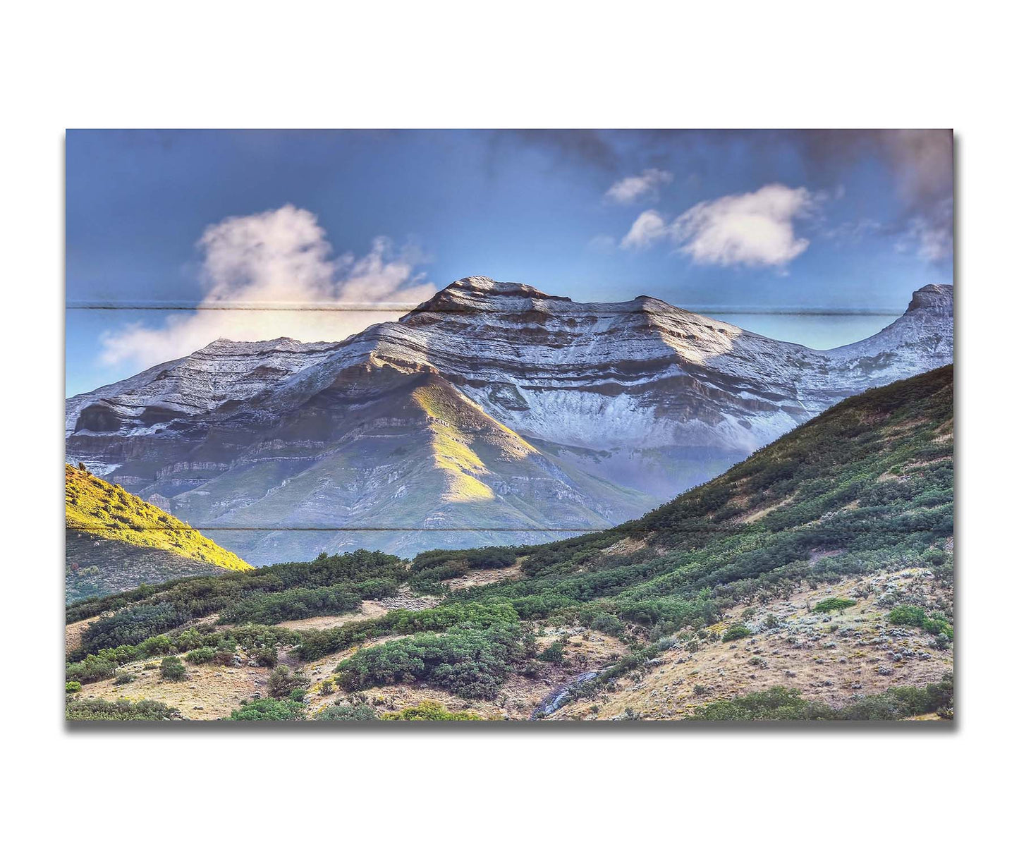 Photo of Mount Timpanogos in Utah, lightly dusted with snow against a blue sky. Printed on a box board.