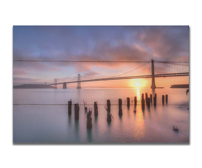 Photo of the Oakland Bay Bridge in San Francisco at sunrise, taken from the Embarcadaro. Printed on a box board.