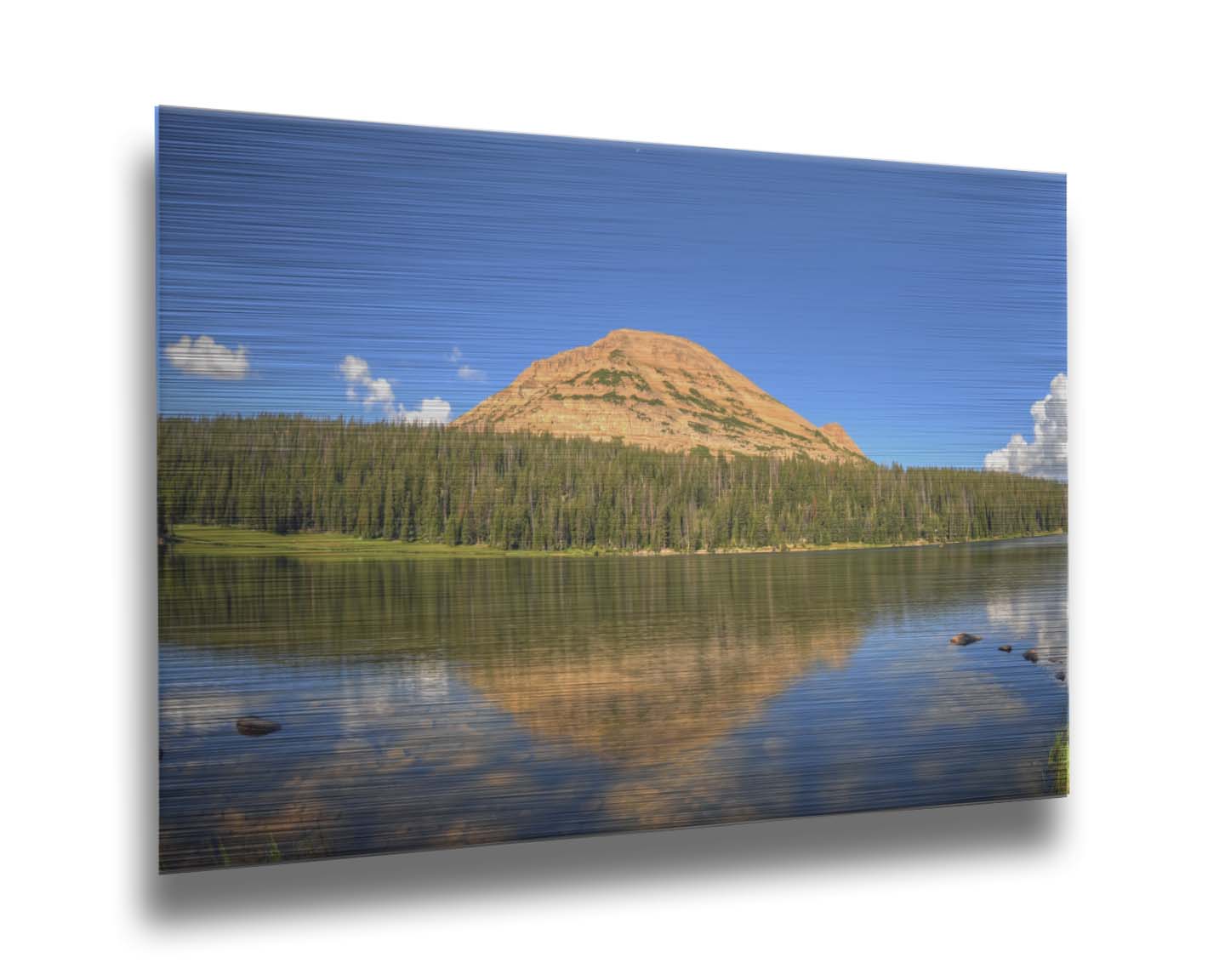 Photo of Mirror Lake in Utah. A mountain, forest, blue sky, and fluffy clouds are reflected on the lakewater. Printed on metal.