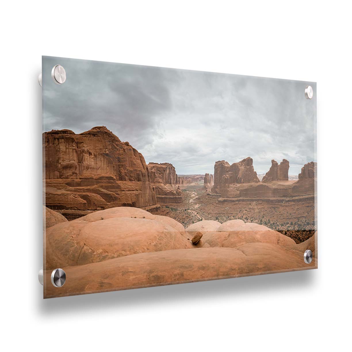 A photograph of Park Avenue at Arches National Park, looking out between rocky plateaus. Printed on acrylic.