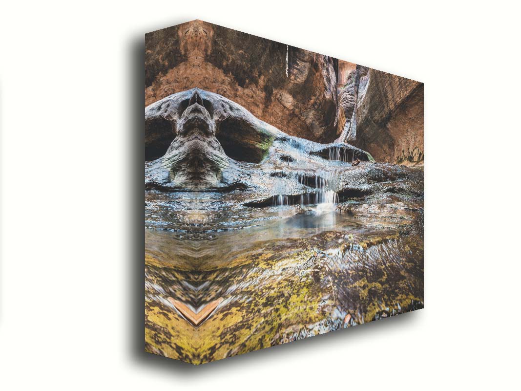 A photo of the Left Fork North Creek flowing through the Subway slot canyon in Utah's Zion National Park. It flows toward the camera, tumbling over slabs in the sandstone to create small waterfalls. Printed on canvas.