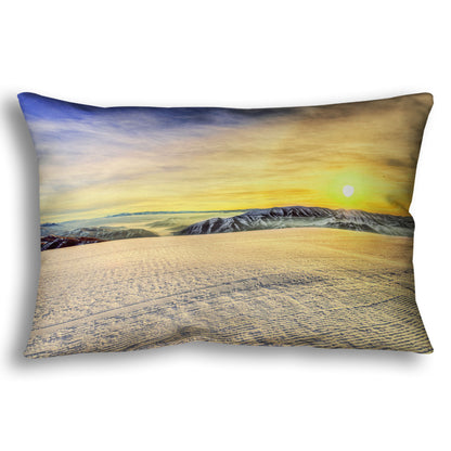 A throw pillow designed with a photo of the sunrise over a freshly groomed ski slope at Sundance Ski Resort.