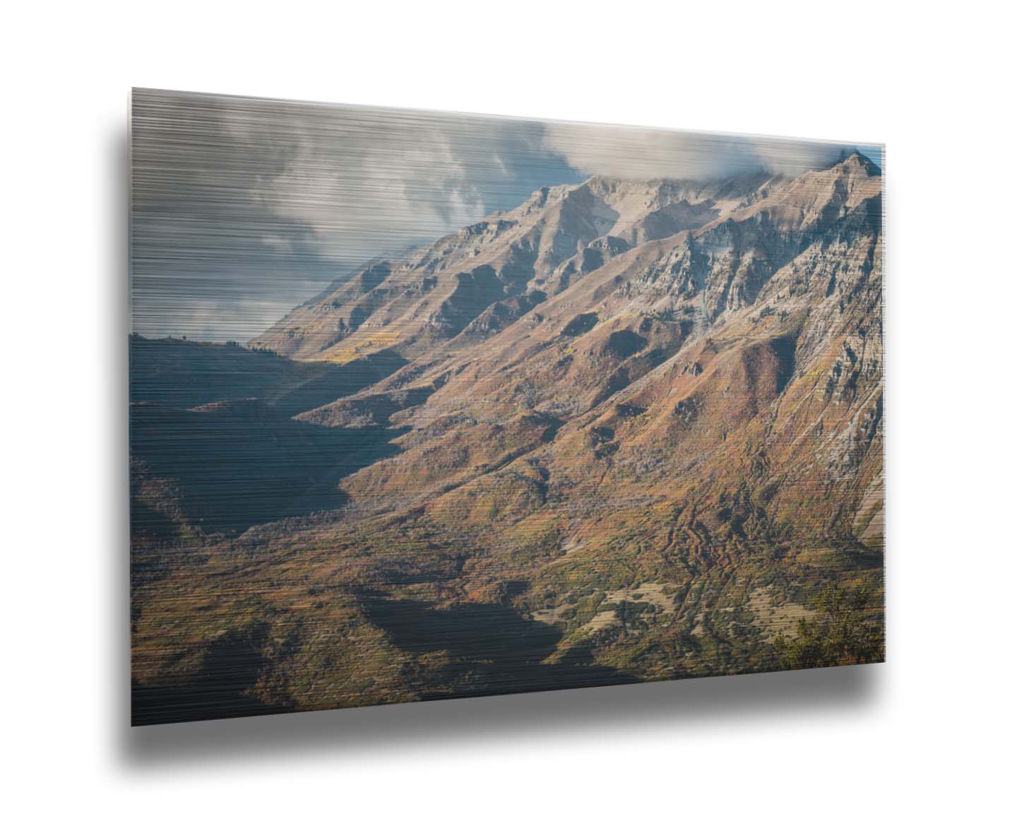 A photo of Mount Timpanogos during the fall. Taken from Piestewa Peak, this photo looks down across groves of trees turning color, appearing small from the altitude. Printed on metal.