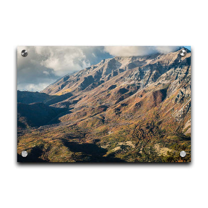 A photo of Mount Timpanogos during the fall. Taken from Piestewa Peak, this photo looks down across groves of trees turning color, appearing small from the altitude. Printed on acrylic.